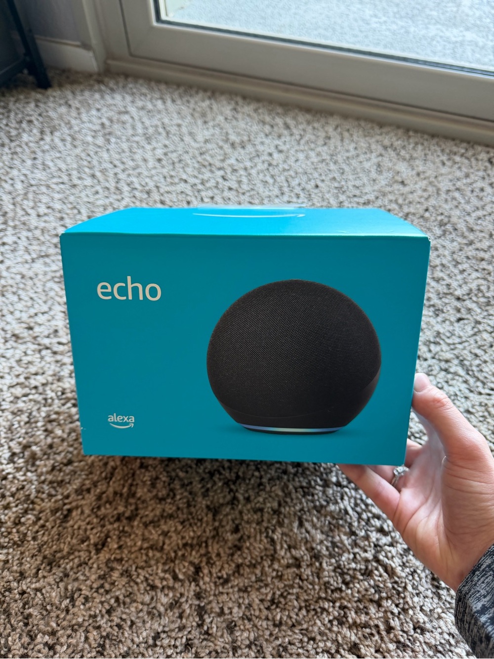 Echo Smart Speaker in Black with Teal Packaging